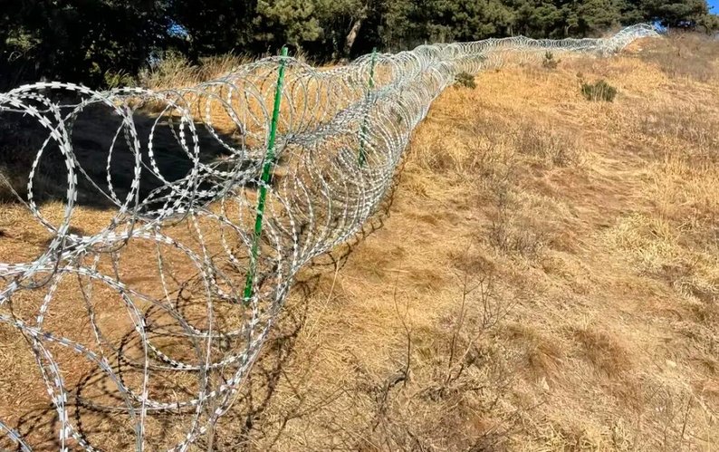 泰山135公里刀片刺绳隔离网风波：防火“铁桶”与千年名山的碰撞